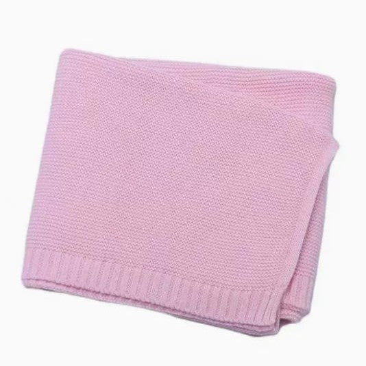 Knitted blanket with embroidered bear and name
